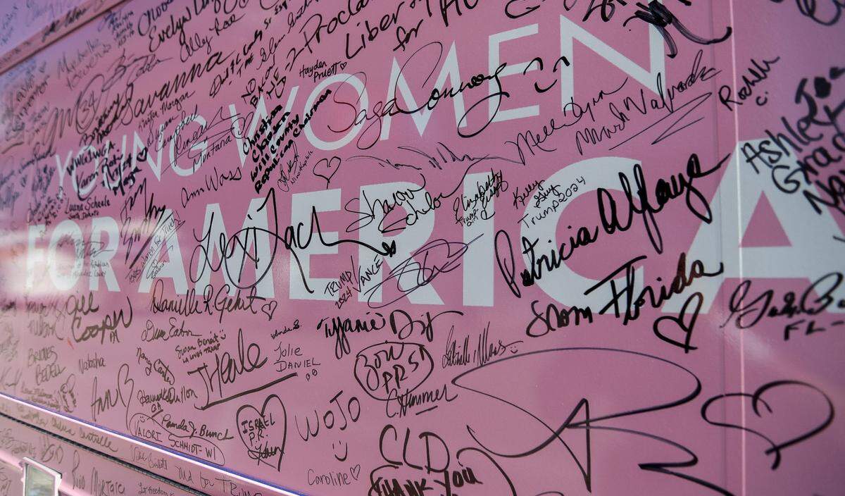 Messages and signatures are seen written on a tour bus from Young Women for America during the final day of 2024 Republican National Convention on Thursday, July 18, 2024, in Milwaukee, Wis. Donald Trump won the Republican presidential nomination and selected U.S. Sen. JD Vance (Ohio) as his running mate.