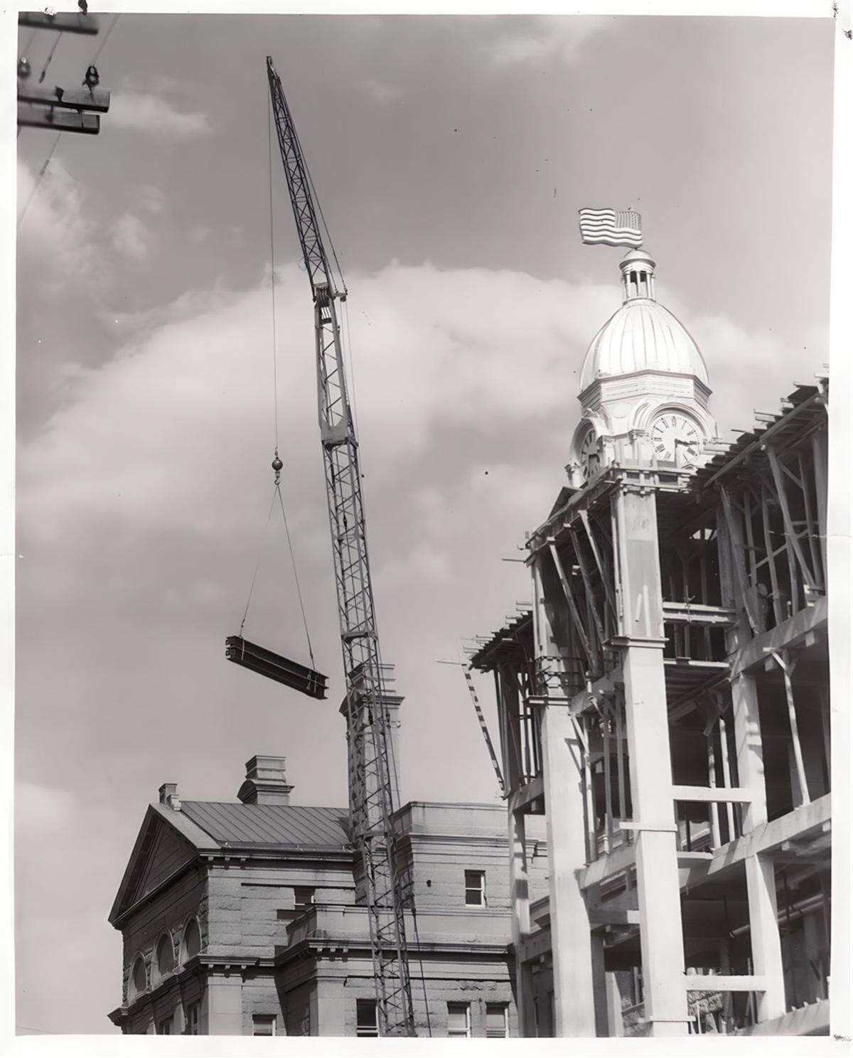 A photo of the old Civil Courts Building construction Aug. 29, 1957, also shows the electric flag atop the Tarrant County Courthouse.