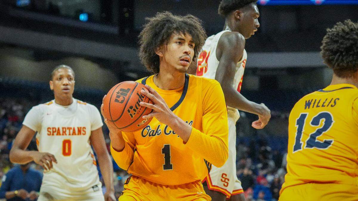 Dallas Oak Cliff Faith Family’s Doryan Onwuchekwa (1) pull down a rebound against Stafford in a Class 4A state semifinal on Friday, March 8, 2024 at the Alamodome in San Antonio, Texas. Faith Family defeated Stafford 59-40.
