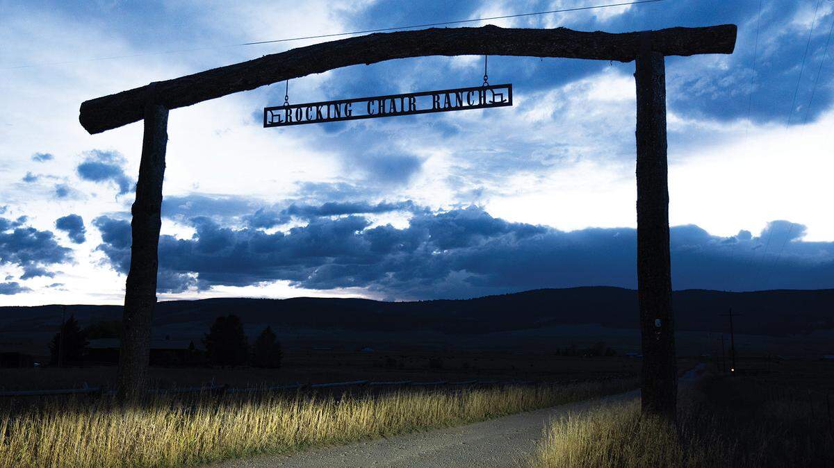 A ranch sign that sits on the property
