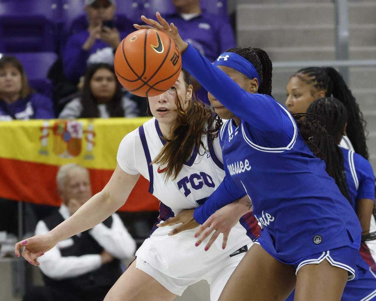 TCU forward Marta Suarez (7) watches as Tennessee State forward Kiki Roberts (3) looses control of the ball during the second quarter of a NCAA women's basketball game between Tennessee State and TCU at Schollmaier Arena in Fort Worth, Texas, Wednesday Nov. 12, 2025.