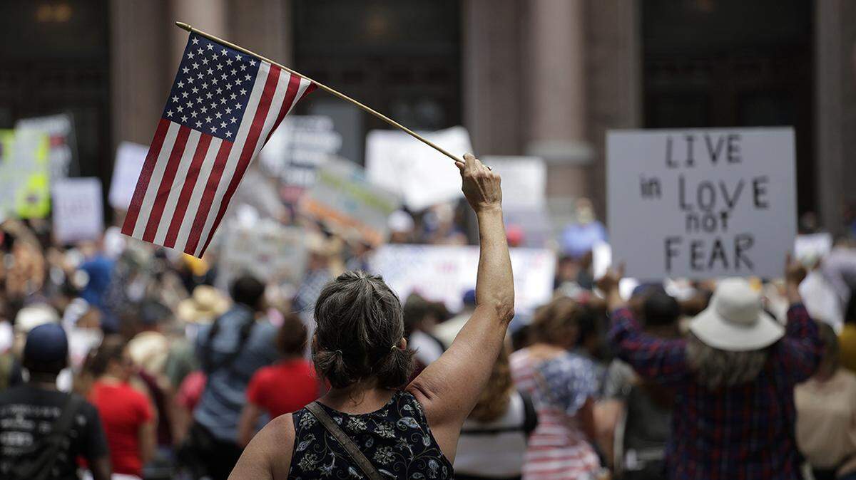 Protesters attend an “Open Texas” rally at the Texas State Capitol, Saturday, April 25, 2020, in Austin.