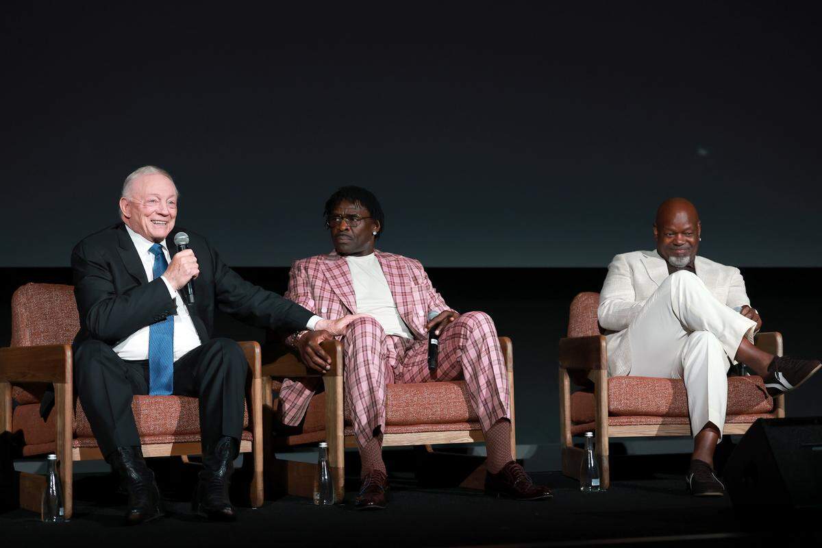 Jerry Jones, Owner, President & GM, Dallas Cowboys, Michael Irvin and Emmitt Smith speak onstage during the premiere of Netflix’s “America’s Team: The Gambler and His Cowboys” at The Egyptian Theatre Hollywood on August 11, 2025 in Los Angeles, California.