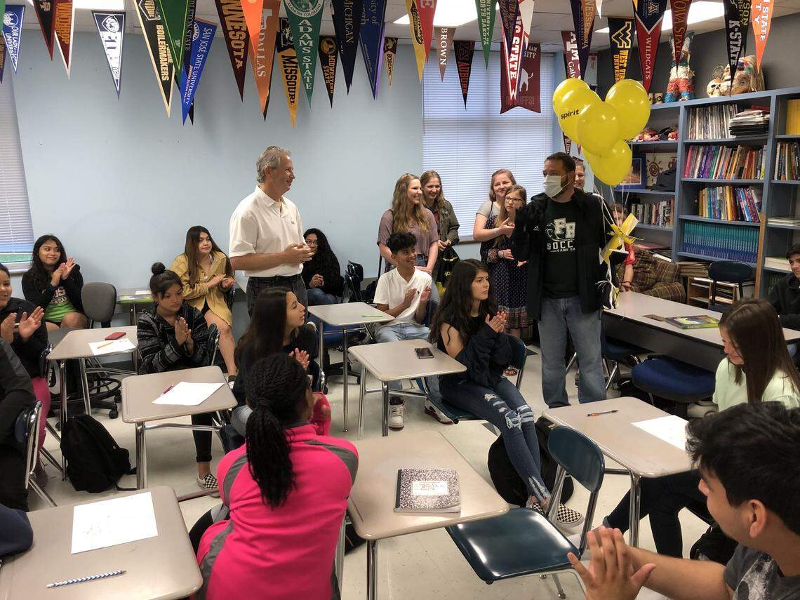 Fossil Ridge coach Adam Webb being surprised with a trip to Boston.