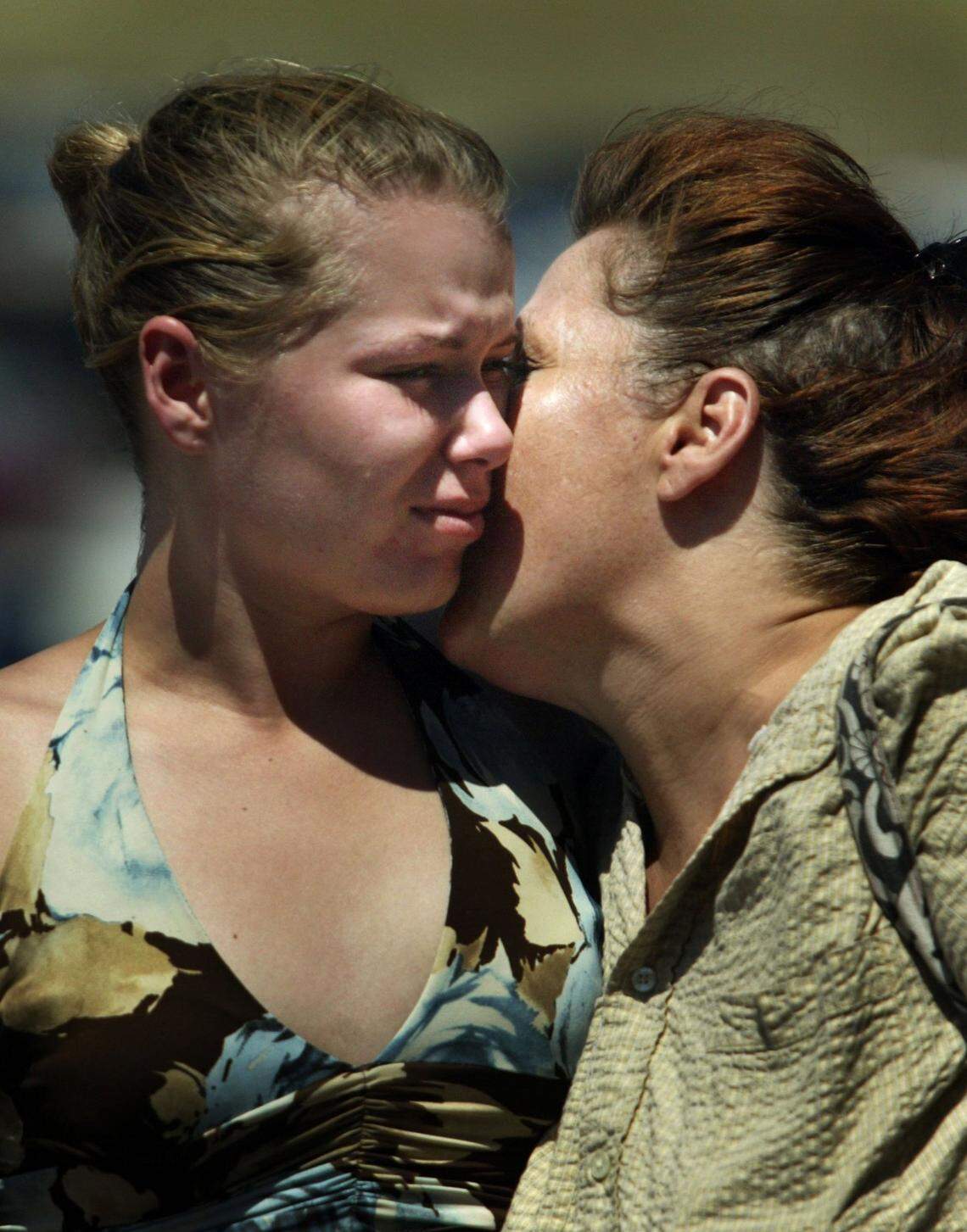 Taylor Frankum, 17, of Arlington gets a reassuring kiss from her mom after tearfully leaving Texas Stadium in Irving on Aug. 6, 2007, after auditioning for “American Idol.”