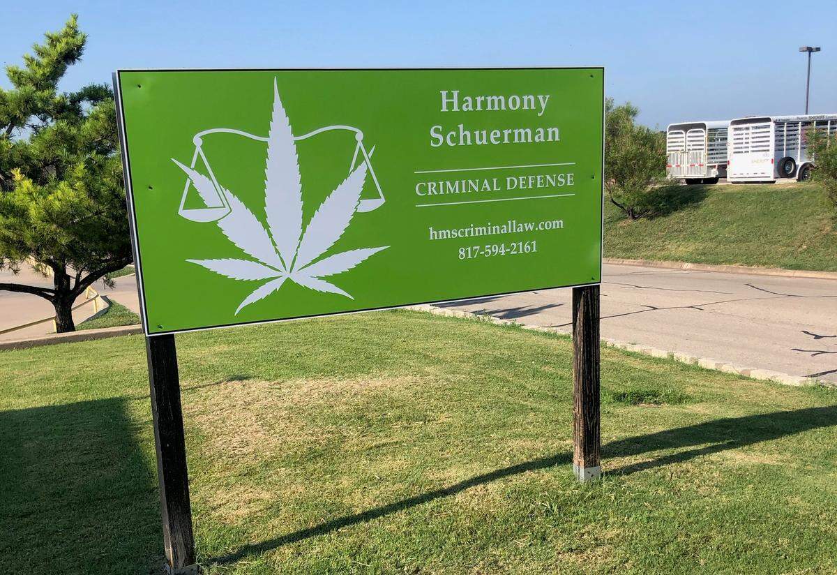 A sign that advertised legal services in Weatherford was taken down after complaints about the marijuana leaf logo reached the attorney’s landlord