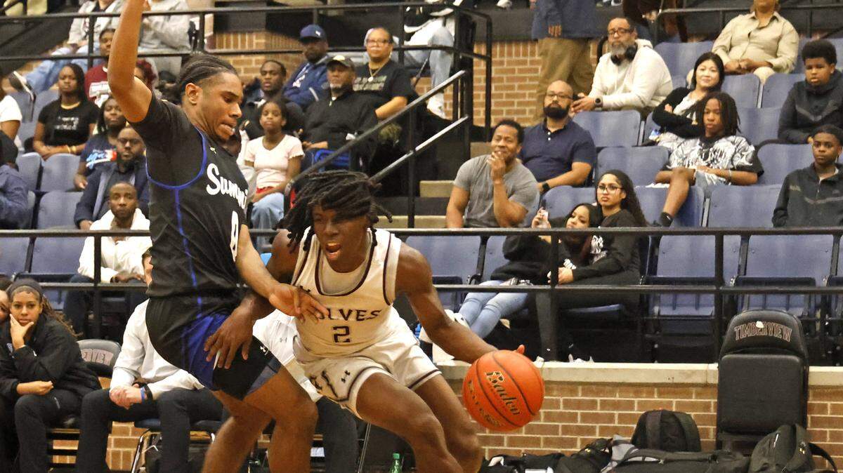 Mansfield Timberview guard Jonathan Williams (2) turns the corner on Mansfield Summit guard Mason Williams (0) during the first half of a UIL boys basketball game at Mansfield Timberview High School in Arlington, Texas, Tuesday Feb. 10, 2026.
