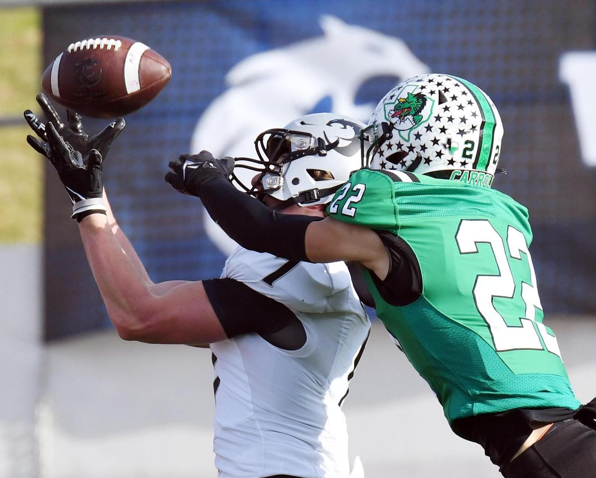 Denton Guyer’s Landon Sides, left brings in the catch over Southlake Carroll’s Logan Lewandowsk for the touchdown to take a 21-7 lead in the first quarter of Saturday’s December 3, 2022 6A Division 2 Region 1 Finals playoff football game at the Northwest ISD Stadium in Justin, Texas. Special/Bob Haynes