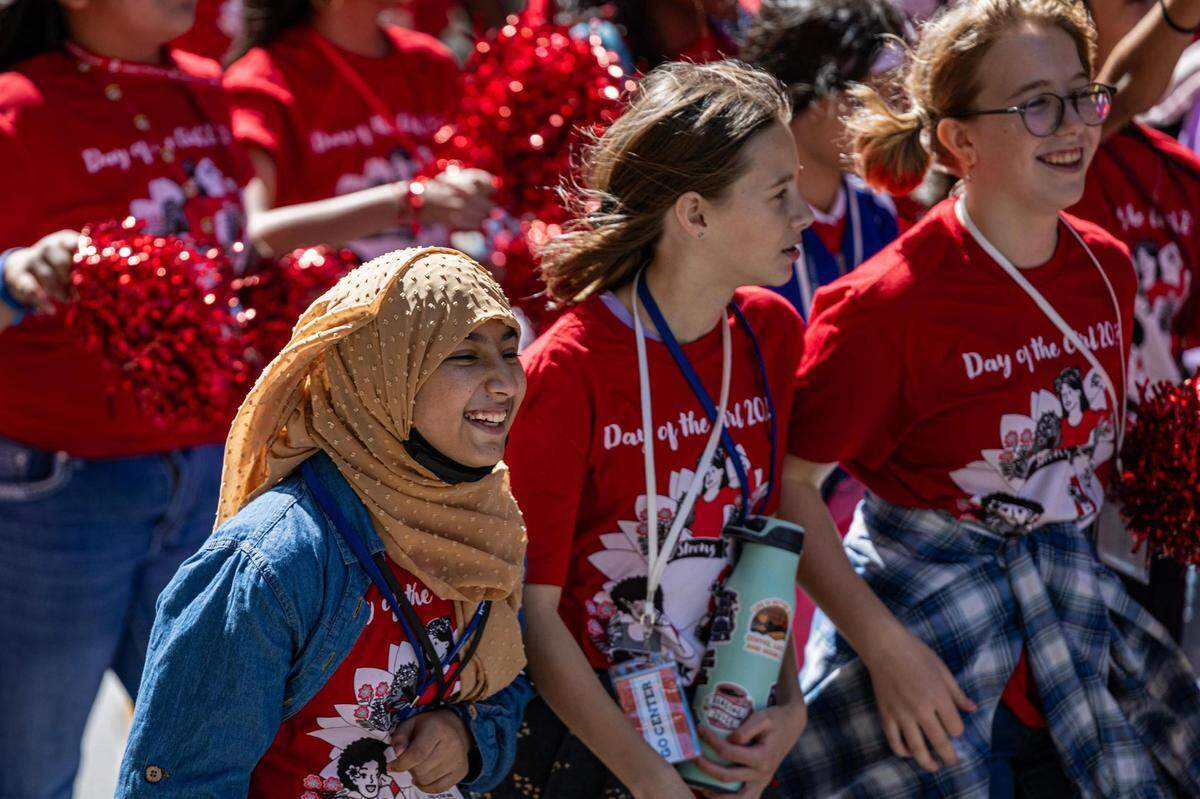 Thousands of girls and members of the Girls Inc. of Tarrant County march down Cherry Street for the 2023 Day of the Girl march at Burnett Park in Fort Worth on Friday.
