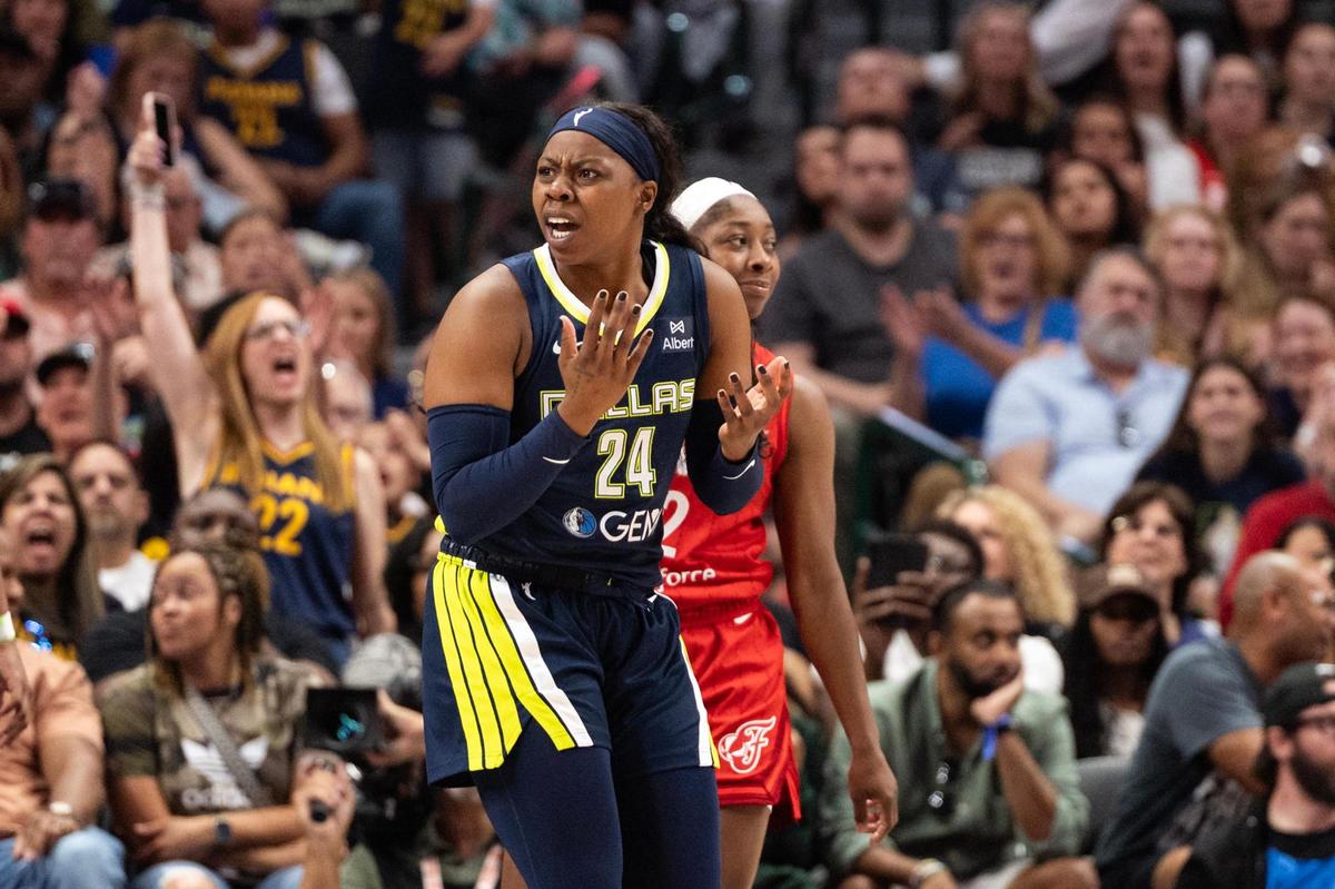 Dallas Wings guard Arike Ogunbawale (24) reacts after a foul is called on her in the first half of a WNBA game between the Dallas Wings and Indiana Fever at the American Airlines Center in Dallas on Friday, June 27, 2025.