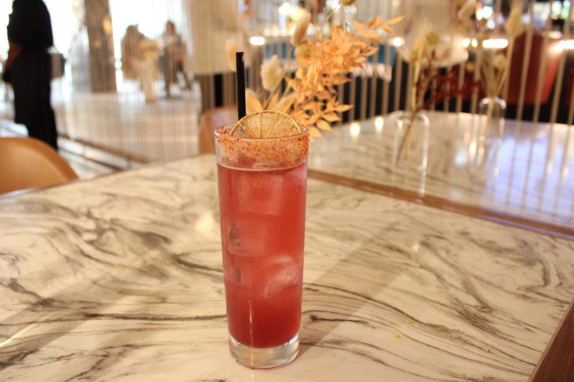 The Blackberry Paloma with Socorro tequila, rimmed with a do-it-yourself concoction of tajin, salt, and cayenne pepper at West + Stone, Fort Worth’s newest restaurant and bar. Tuesday, April, 23, 2024.
