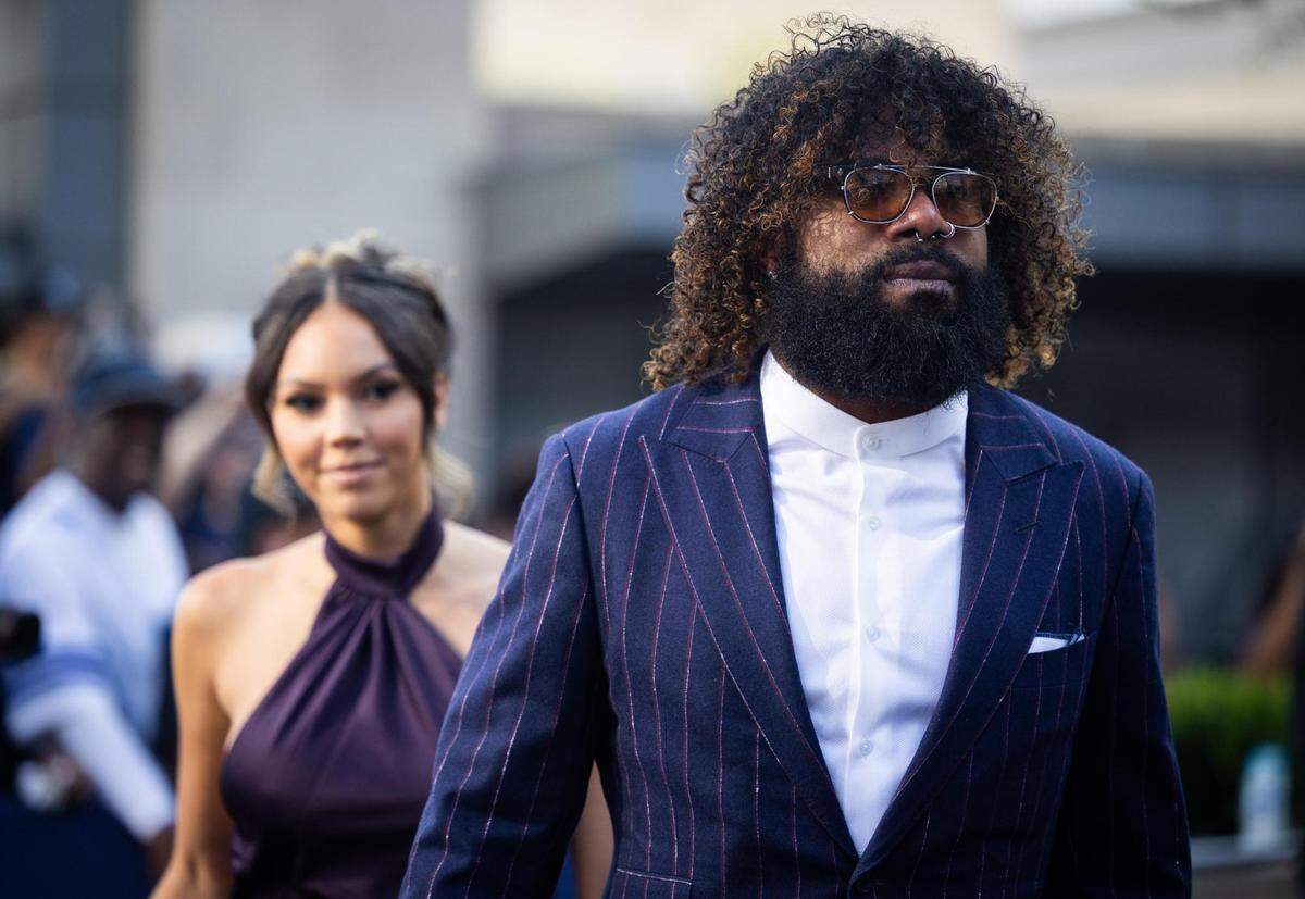 Dallas Cowboys Ezekiel Elliott walks the blue carpet for the season kickoff event Thursday, Aug. 25, 2022, at Ford Center in Frisco.