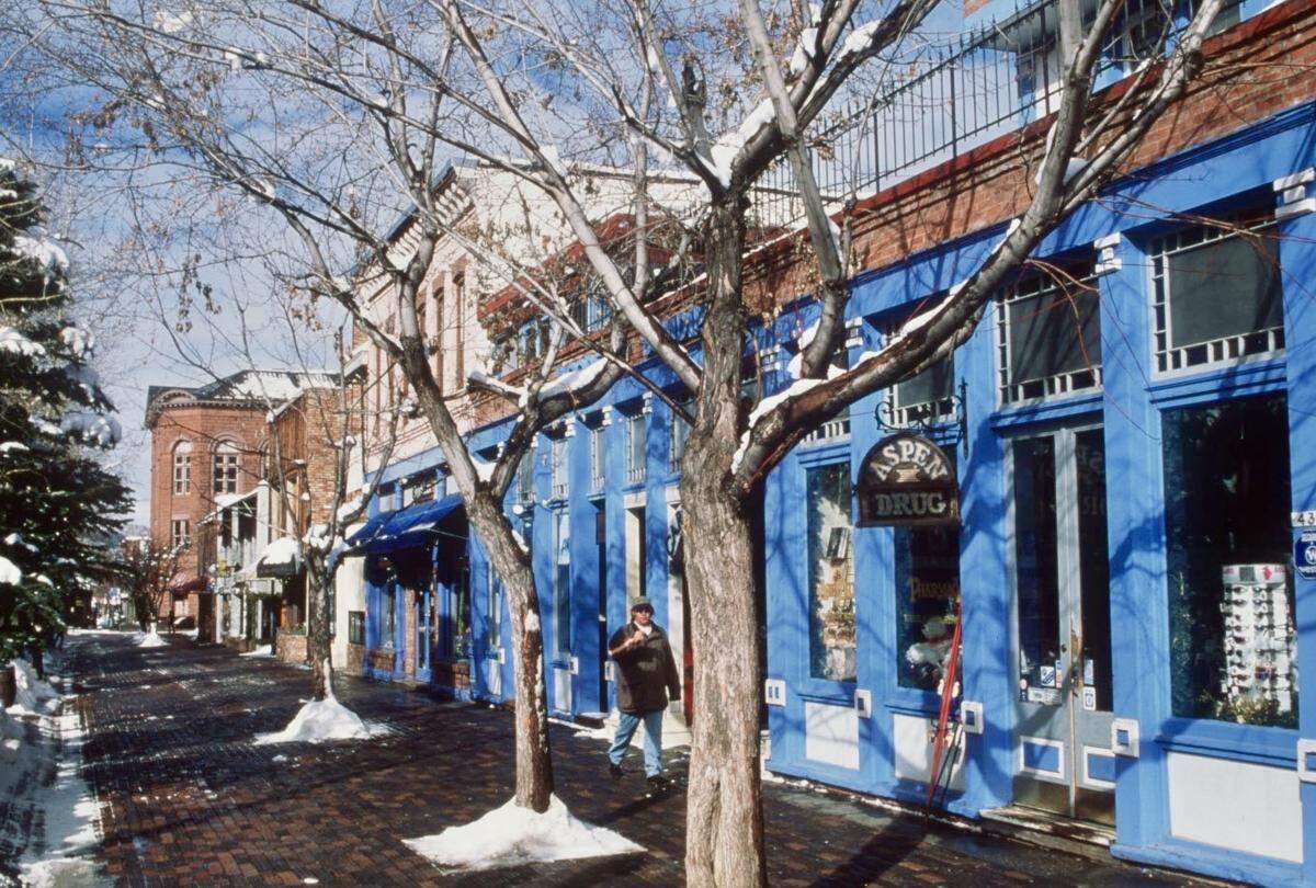 The revival of Aspen, Colorado, began 70 years ago. Chic shops and colorful storefronts, above, attract skiiers from around the world.