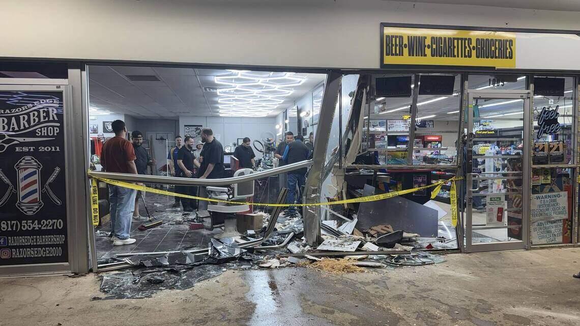 WATCH: Euless barbershop open though badly damaged after car crashes into building