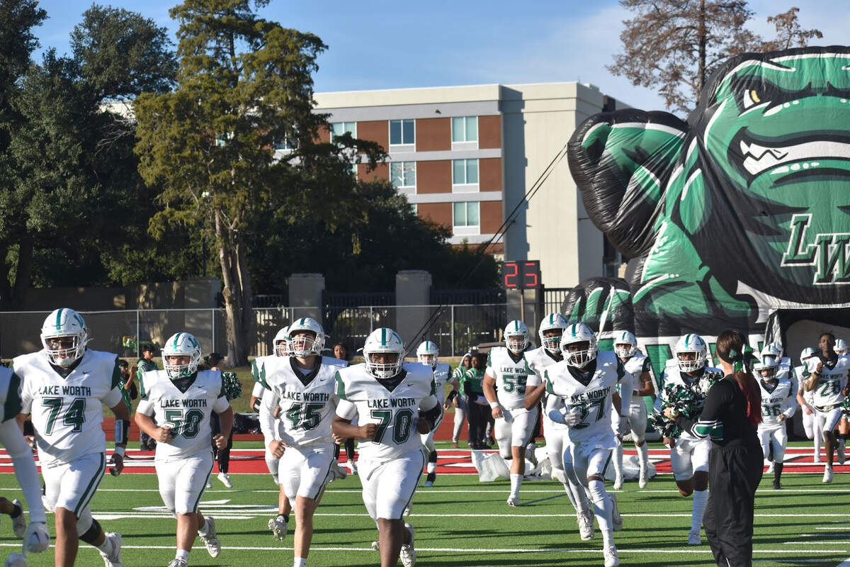 Lake Worth takes the field during a high school football game against Eastern Hills at Farrington Field in Fort Worth, Texas Thursday, November 2, 2023.