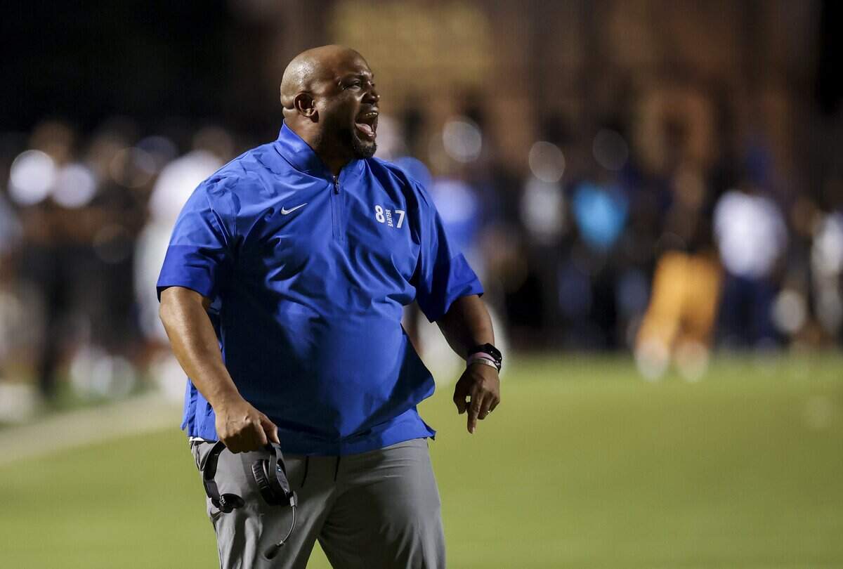 North Crowley head coach DeMarcus Harris calls out to the team during the first half of the game against Waxahachie on Friday, Oct. 9, 2026, at Stuart B. Lumpkins Stadium in Waxahachie.