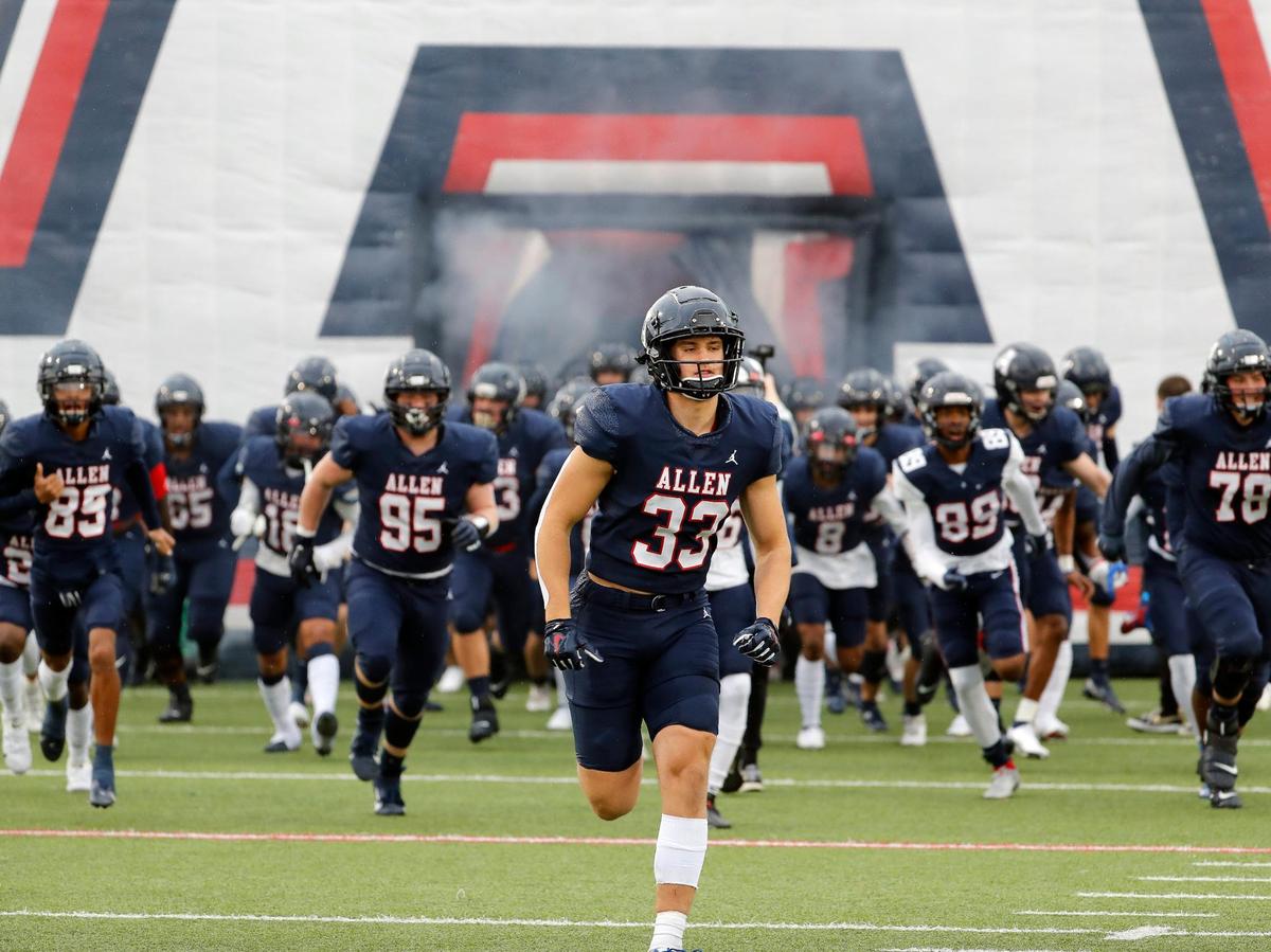Allen Eagles enter the field for the start of a high school Class 6A Division 1 Regional playoff game at Eagle Stadium in Allen, Texas, Saturday, Nov. 27, 2021. Allen led 38-7 at the half. (Special to the Star-Telegram Bob Booth)