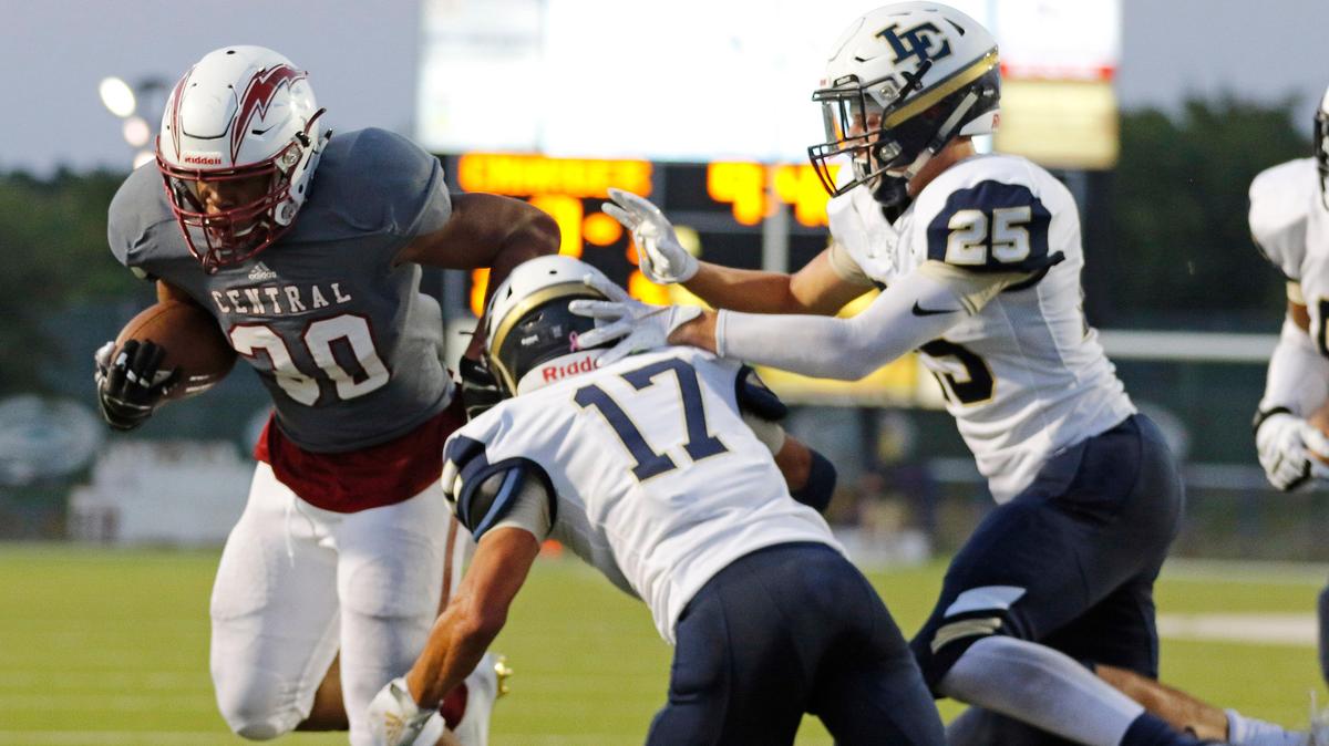 Keller Central running back Andrew Paul (30) is stopped short of the goal line by Little Elm linebacker Jonas Garrett (8), defensive back Andrew Bishop (17) and tight end/linebacker Tristen Bagby (25) during the first half of a high school football game at KISD Stadium in Keller, Texas, Saturday, Sept. 14, 2019. Paul scored on the ensuing play. Central led 20-6 at the half. (Special to the Star-Telegram Bob Booth)
