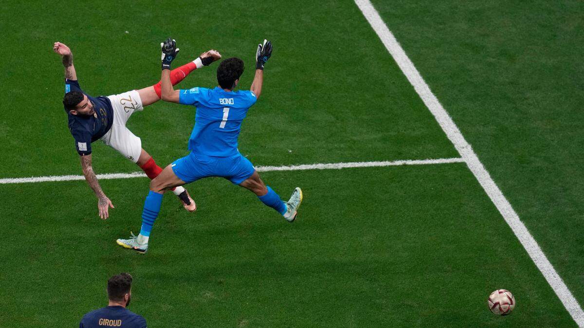 France’s Theo Hernandez, left, shoots to score his side’s opening goal during the World Cup semifinal soccer match between France and Morocco at the Al Bayt Stadium in Al Khor, Qatar, on Wednesday.