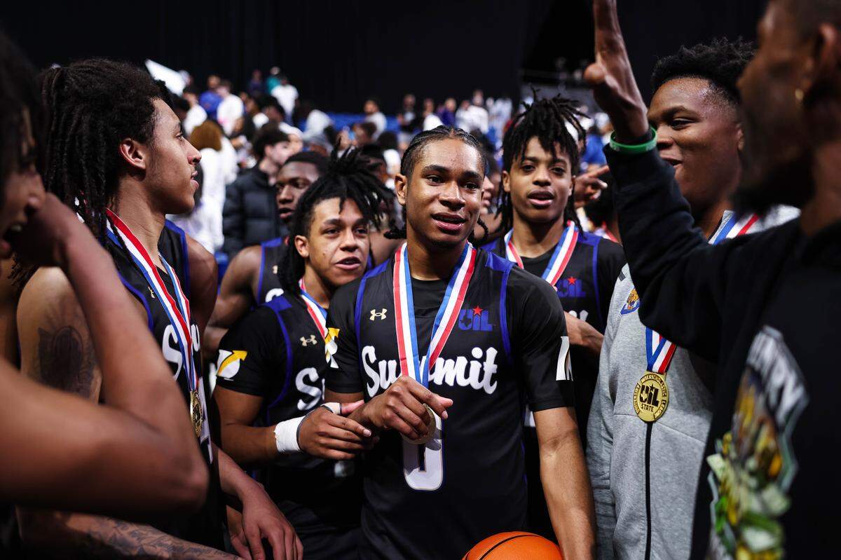 Mansfield Summit players gather in a circle in celebration after winning the Class 5A Division II state championship game against Beaumont United on Saturday at the Alamodome in San Antonio.