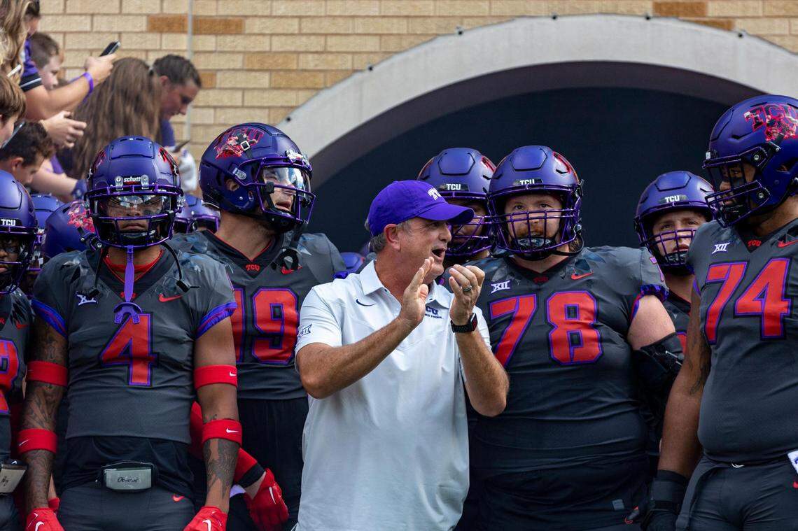 TCU head coach Sonny Dykes gathers with his team before their game against OSU begins at the Amon G. Carter Stadium in Fort Worth, on Saturday, Oct. 16, 2022.