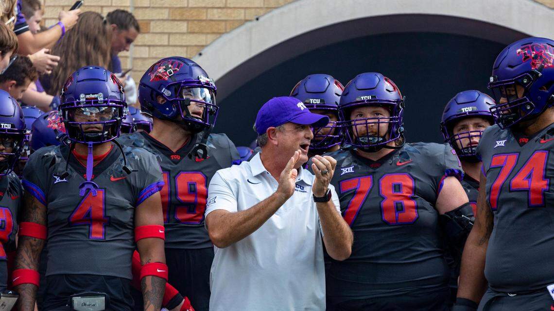 TCU head coach Sonny Dykes gathers with his team before their game against OSU begins at the Amon G. Carter Stadium in Fort Worth, on Saturday, Oct. 16, 2022.