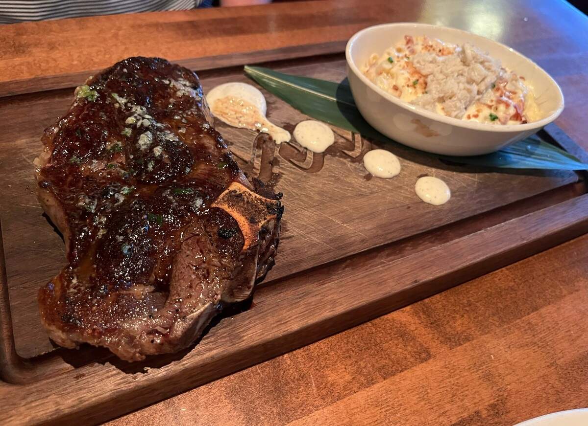Bone In Wagyu Strip at the Winewood Grill with a side of Crab Mac and Cheese.