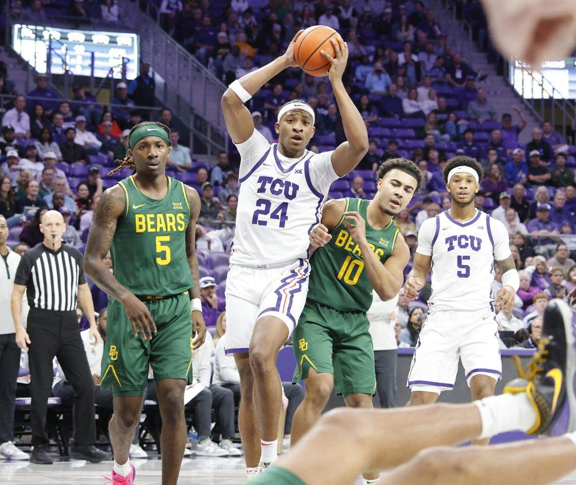 TCU forward Xavier Edmonds (24) grabs a rebound during the first half of a NCAA basketball game between Baylor University and TCU at Schollmaier Arena in Fort Worth, Texas, Saturday Jan. 03, 2026