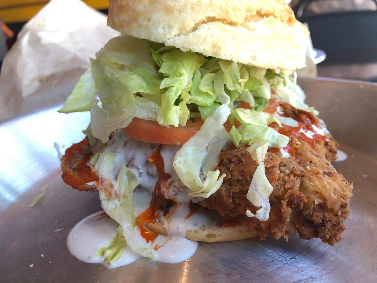 A Buffalo-sauce chicken biscuit with blue cheese at Ben’s Triple B.