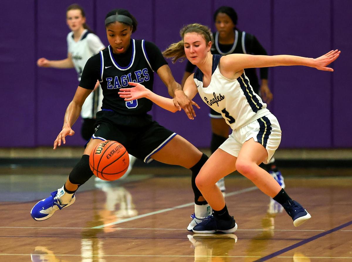Fort Worth Southwest Christian guard Arieona Rosborough (L) and Houston Second Baptist guard Ella Ryan (3) go for a loose ball during the first half of the 5A TAPPS Girls Basketball State Championship game played on March 12, 2021 at College Station High School in College Station, TX. (Steve Nurenberg Special to the Star-Telegram)