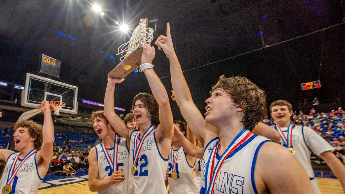 The Lipan boys celebrate their Texas Class 2A basketball title Saturday in the Alamodome in San Antonio Saturday.
