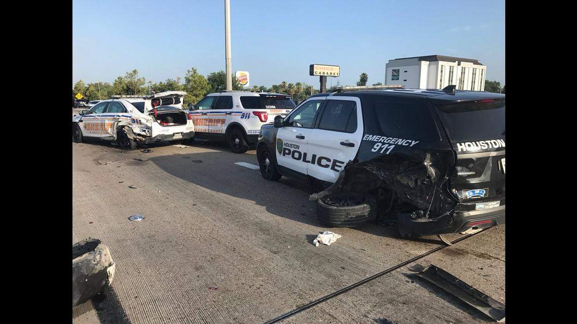 Police say they suspect the 18-year-old driver who slammed into two police cars during a traffic stop was drunk.