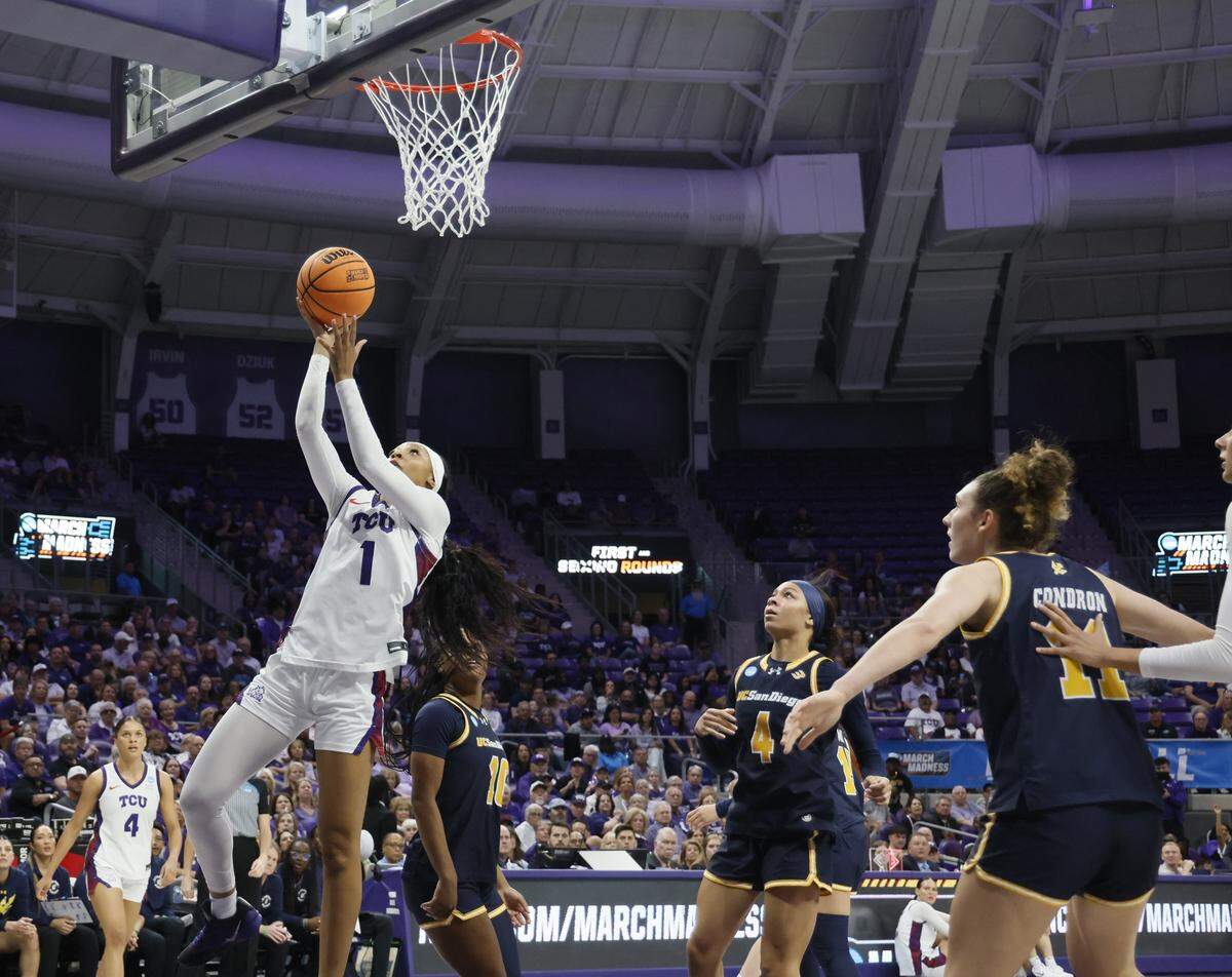 TCU guard Taylor Bigby (1) drops in a bucket against UC San Diego during the first half of an NCAA Division I Women's Basketball Championship game at Schollmeier Arena in Fort Worth, Texas, Friday, March, 20, 2026.