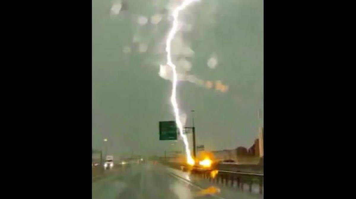 A screen capture of a lightning strike hitting a truck in Fort Worth Thursday, May 16, 2024.