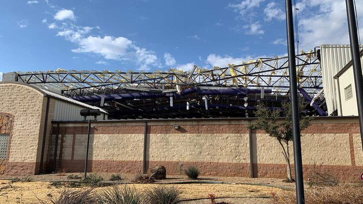 An apparent tornado tore the roof off the gym at Jacksboro High School in North Texas on Monday, March 21, 2022.