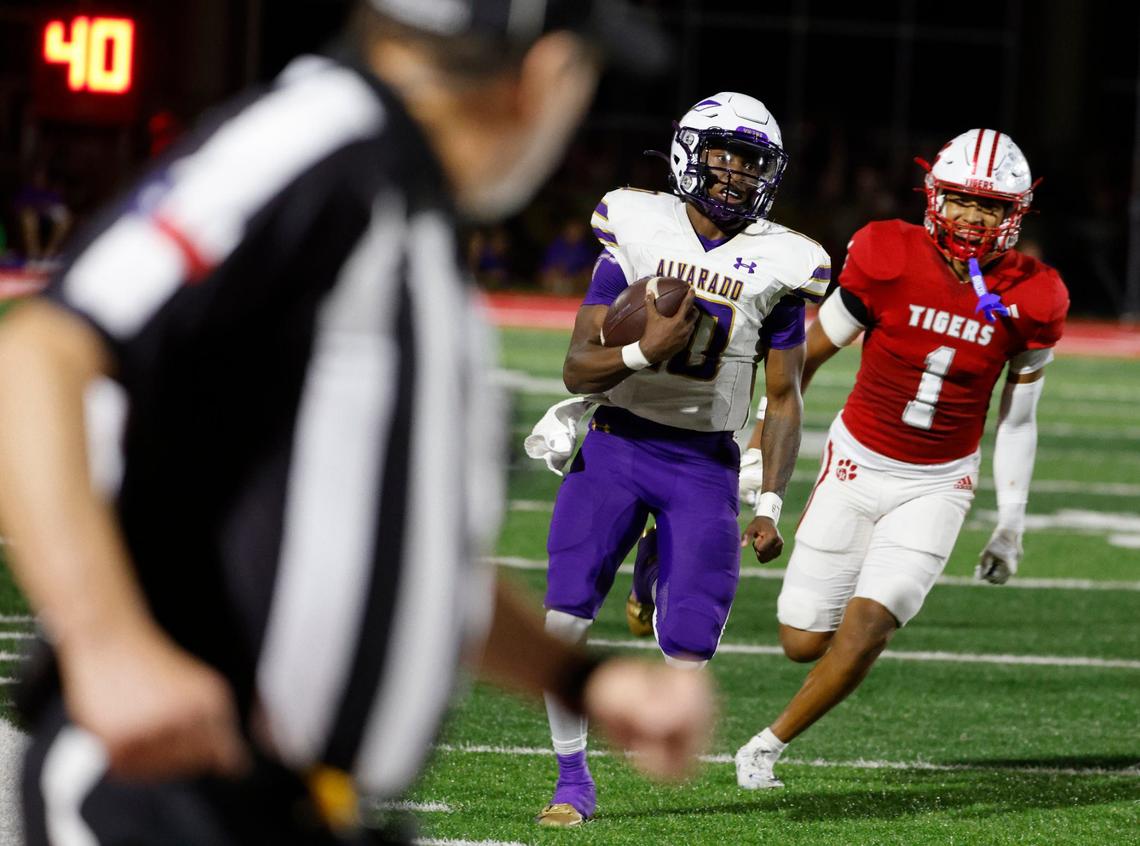 Alvarado quarterback Cardea Collier (10) runs the sidelines for a touchdown during a UIL football game at Tiger Stadium in Glen Rose Texas, Friday, Sept. 27, 2024.