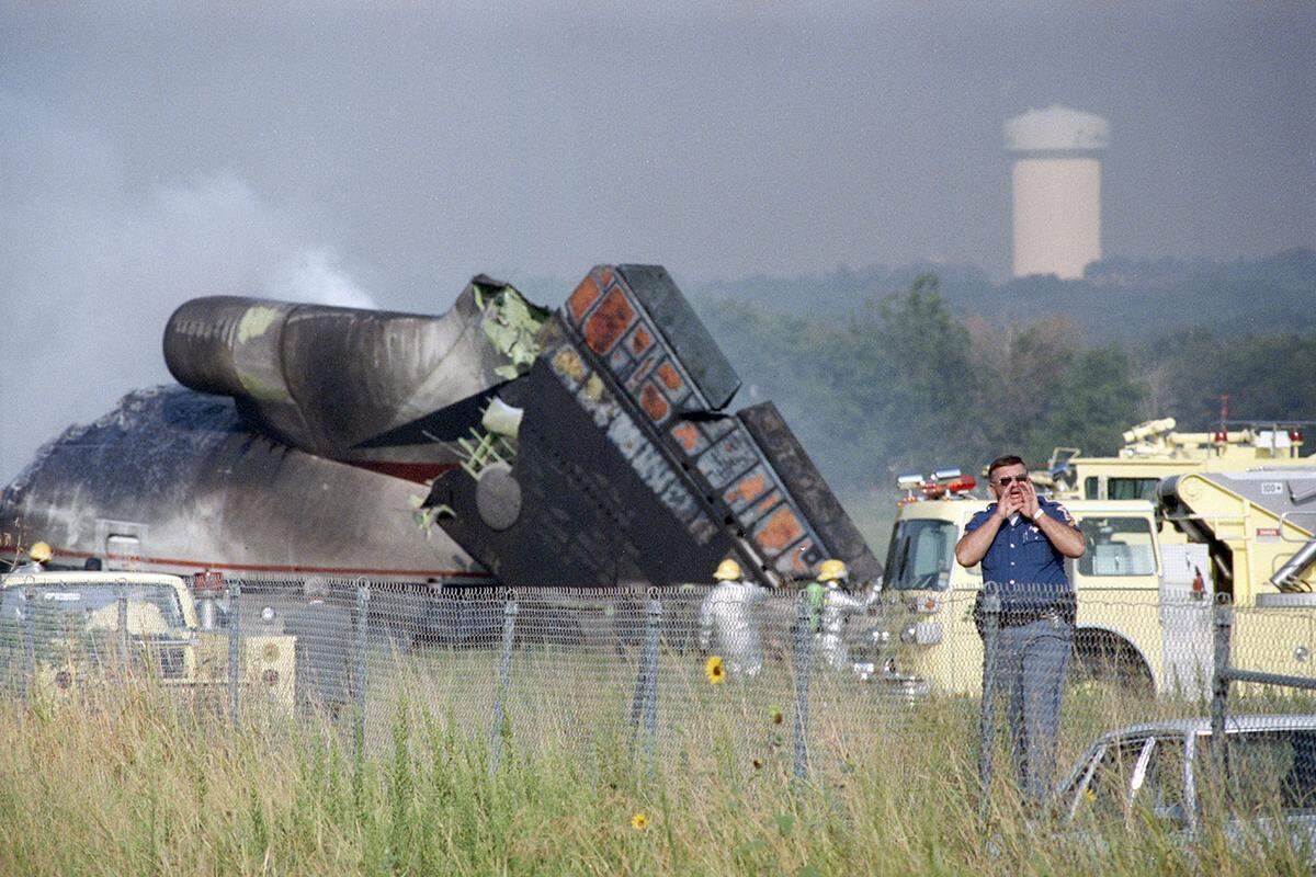 Aug. 31, 1988: The smoldering wreckage of Delta Flight 1141 on the day the Boeing 727 crashed during takeoff at Dallas-Fort Worth International Airport.