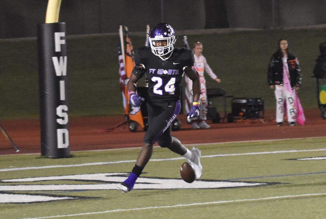Chris Gee (24) walks after scoring a touchdown for Paschal against Haltom during a football game at Farrington Field in Fort Worth, Texas, Friday, Oct. 15, 2021, Haltom won 20-51. (Michelle Escalante/Special to the Star-Telegram)