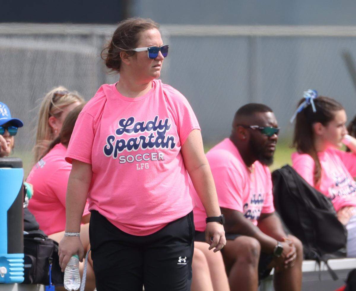 Burleson Centennial head coach Heather McMahan watches action against Prosper Walnut Grove during the second half of a UIL Conference 5A Division I state semifinal soccer game at Keller ISD Athletic Complex in Keller, Tx. Friday, April 03, 2026.