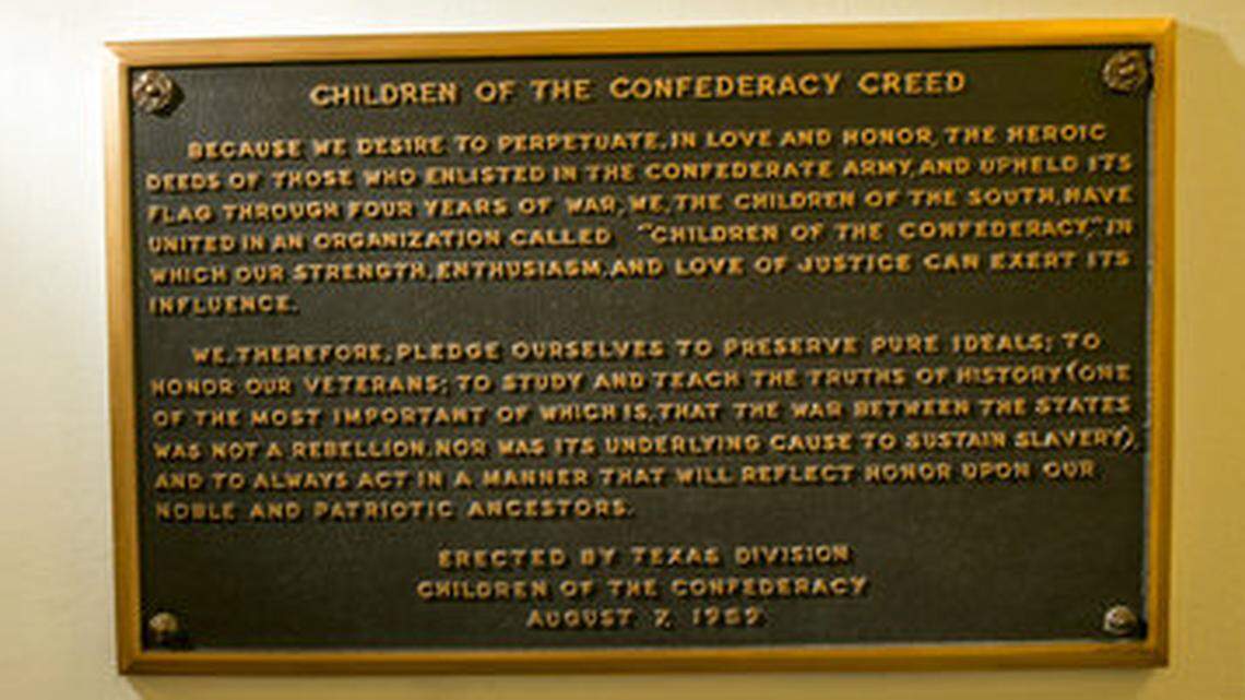 FILE - This Aug. 17, 2017 file photo shows, The Children of the Confederacy Creed plaque at the Capitol in Austin, Texas. House Speaker Joe Straus wants the State Preservation Board, chaired by the Governor, to remove the plaque which claims slavery was not an underlying cause of the Civil War.