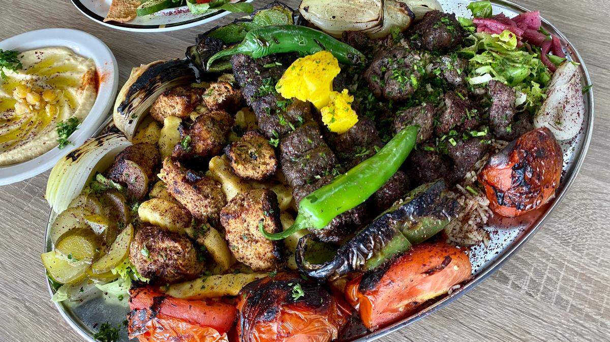 A family-style platter cfeeds four at Nish! Mediterranean Grill.