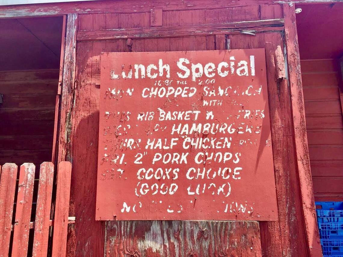 The weatherbeaten sign at the Smoke Pit barbecue restaurant.