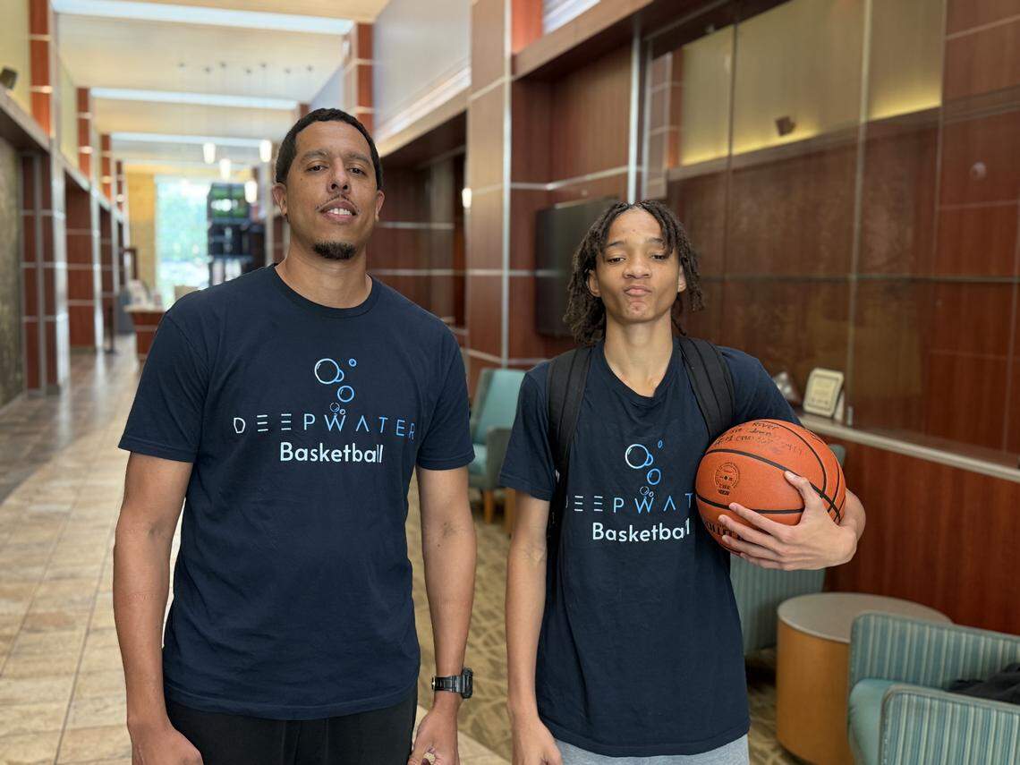 Deep Water Prep head coach Michael Crowell and freshman River Thomas at the Link Event and Recreation Center, where Deep Water Prep students study and train, in North Richland Hills.