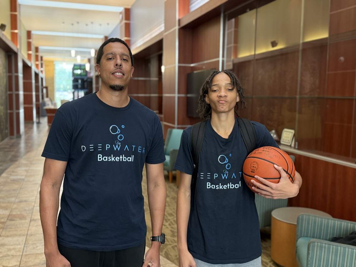 Deep Water Prep head coach Michael Crowell and freshman River Thomas at the Link Event and Recreation Center, where Deep Water Prep students study and train, in Richland Hills.