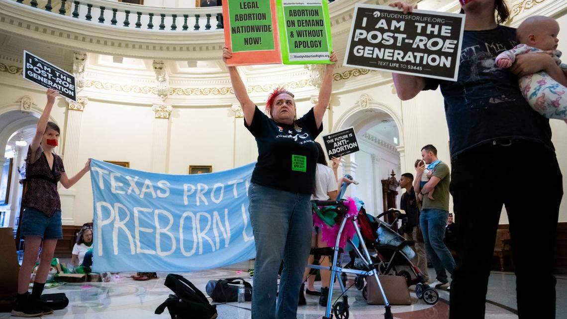 Betsy Riot, center, was among the protesters at the Texas State Capitol in 2023. Both abortion rights and anti-abortion protesters were present on the rotunda.