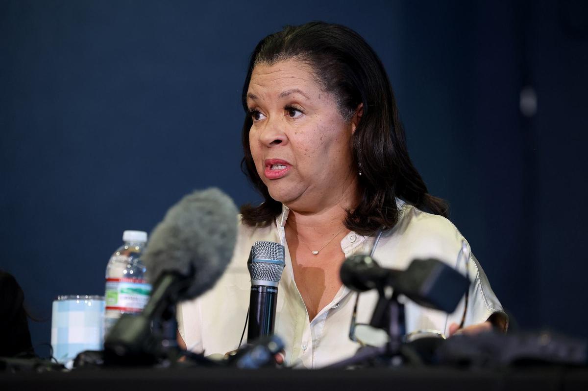 Angela Jones, parent and founding member of Cultural and Racial Equity for Every Dragon, speaks during press conference on Tuesday in Southlake. The groups urged theCarroll school district to negotiate in good faith after it was invited by the U.S. Department of Education’s Office of Civil Rights to negotiate a resolution of four civil rights complaints.