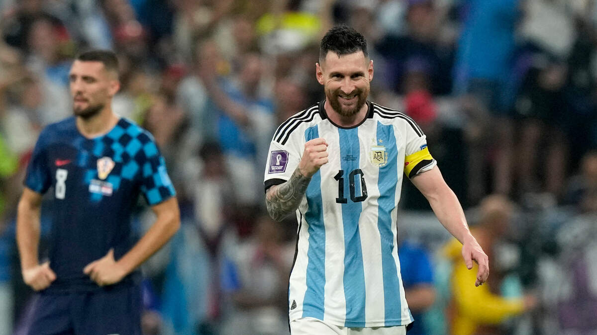 Argentina’s Lionel Messi celebrates after teammate Julian Alvarez scored their side’s third goal during the World Cup semifinal soccer match between Argentina and Croatia at the Lusail Stadium in Lusail, Qatar on Tuesday.