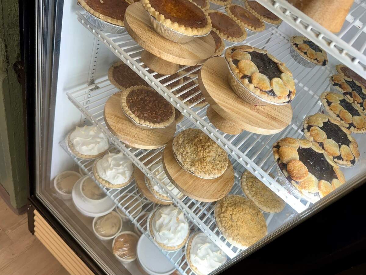 The new expanded pie case at West Side Cafe includes blueberry, pecan, apple crumble and meringue pies.