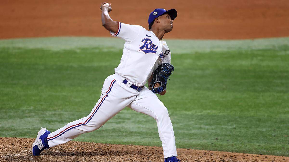 Texas Rangers pitcher José Leclerc thew two scoreless innings to gain the win on Friday in Game 1 of the World Series at Globe Life Field.