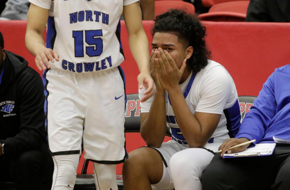 North Crowley’s Malachi Vaughn reacts in the closing moment of the Panters loss to Allen in the Class 6A 1D Regional Semi Final game on Tuesday night at Coppell High School.